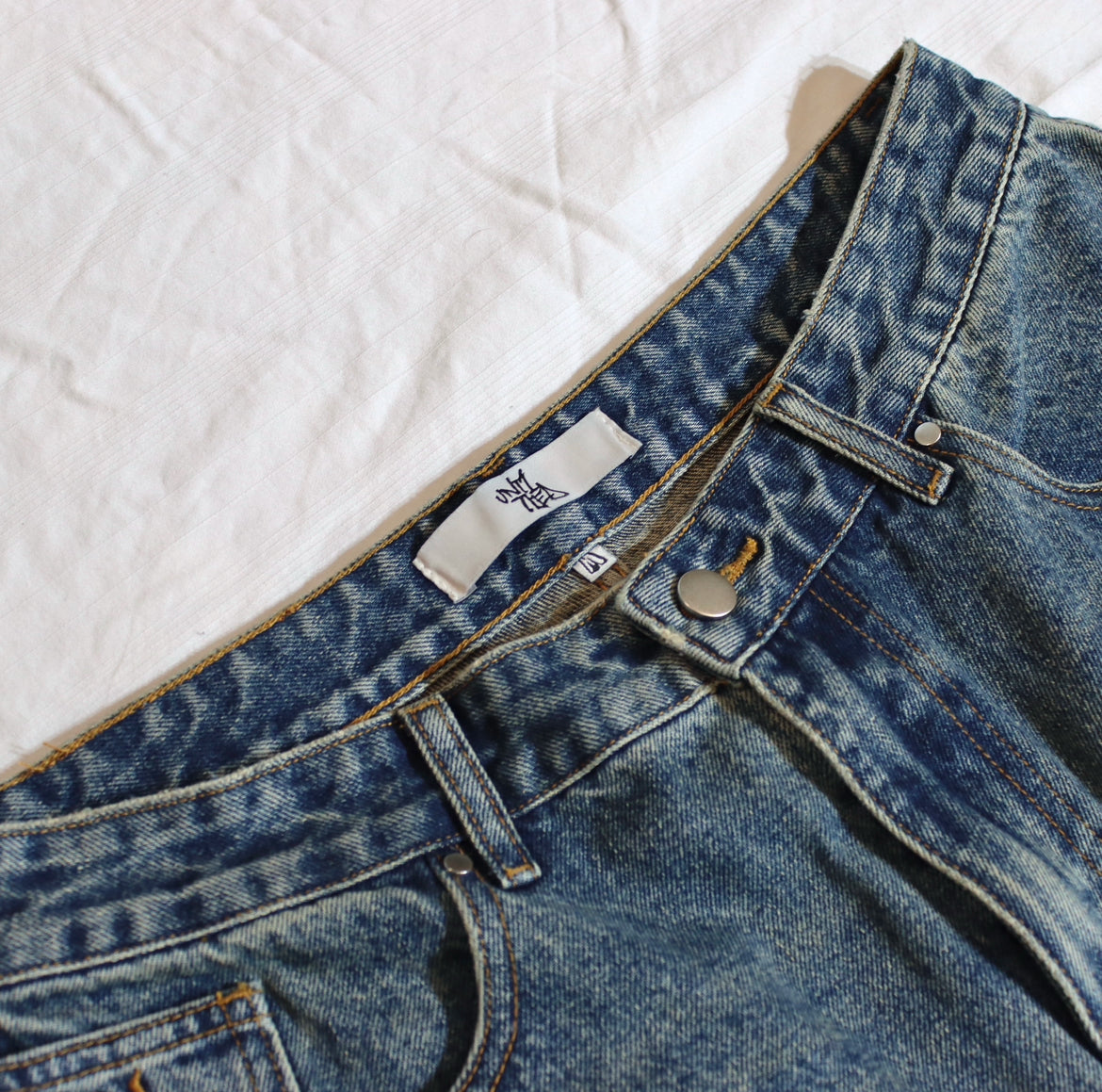 Mud wash blue baggy denim