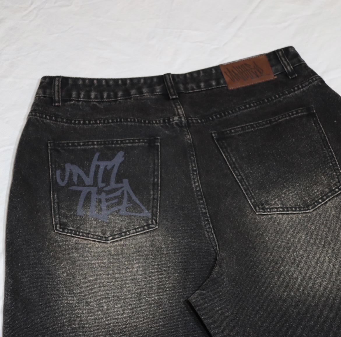 Black mud wash baggy denim